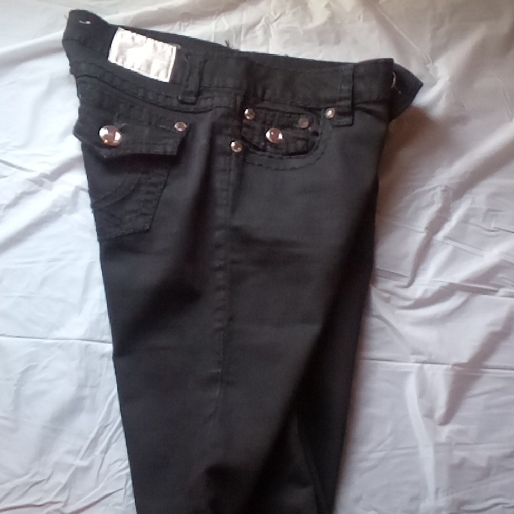 All black capri folded at the bottom for women and girls.